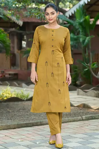 Mustard color smart and elegant roman silk fabric smart looks top bottom set