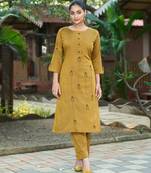 Mustard color smart and elegant roman silk fabric smart looks top bottom set