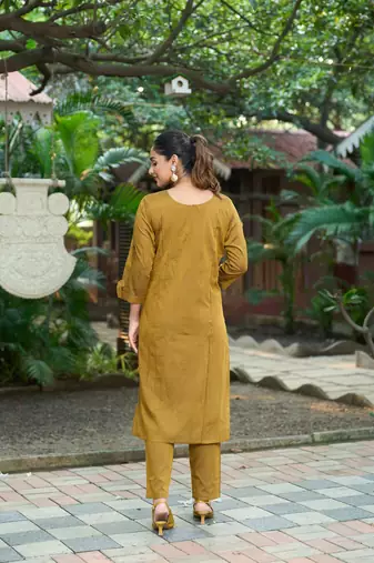 Mustard color smart and elegant roman silk fabric smart looks top bottom set