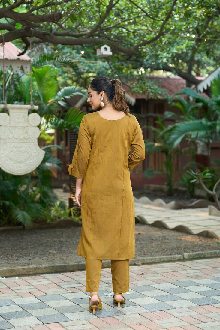 Mustard color smart and elegant roman silk fabric smart looks top bottom set