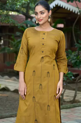 Mustard color smart and elegant roman silk fabric smart looks top bottom set