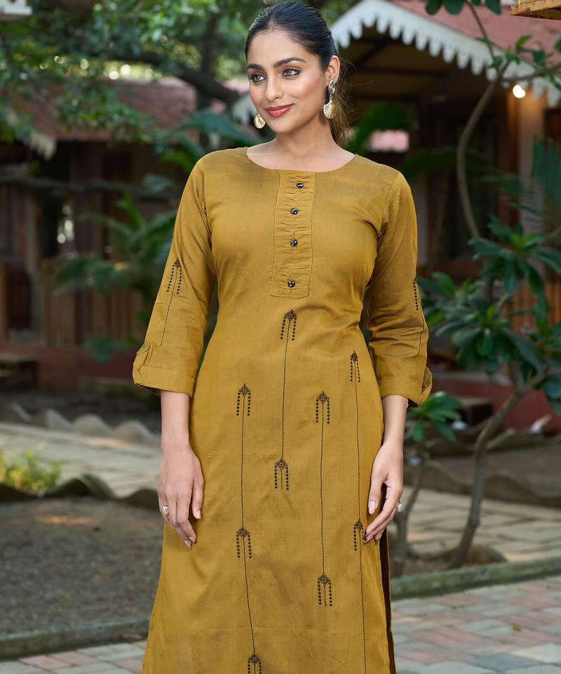 Mustard color smart and elegant roman silk fabric smart looks top bottom set