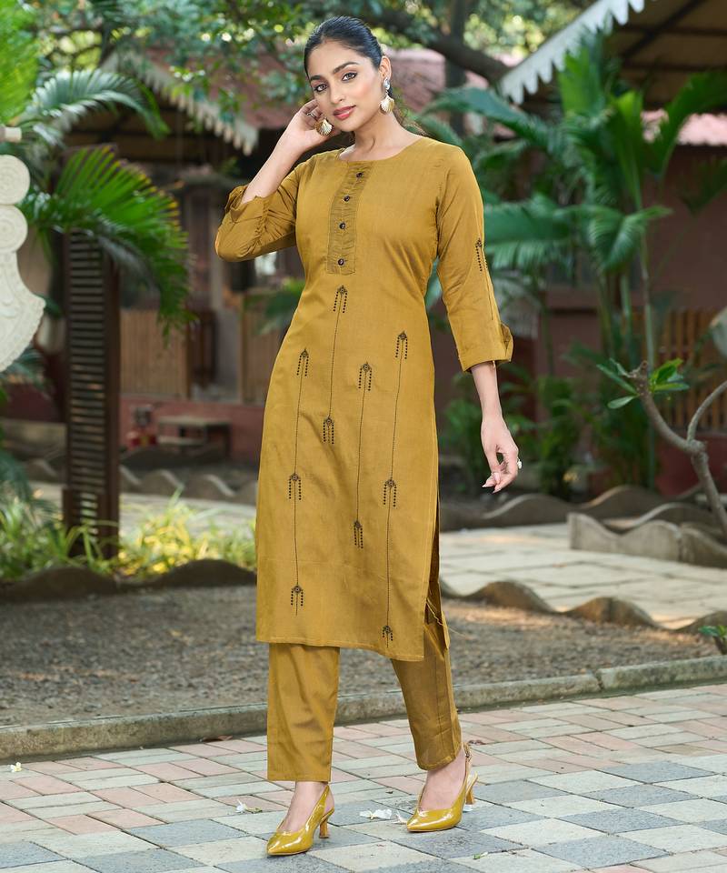 Mustard color smart and elegant roman silk fabric smart looks top bottom set