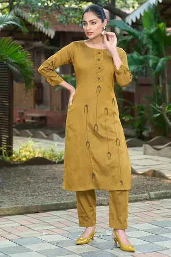 Mustard color smart and elegant roman silk fabric smart looks top bottom set