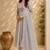 Cream color roman silk fabric thread embroidery work stylish readymade suit