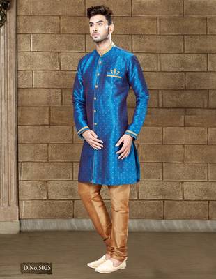 Royal-blue sherwani with gold accents and matching pocket square—ideal for celebrations. 1
