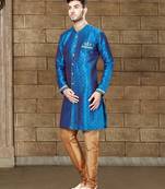 Royal-blue sherwani with gold accents and matching pocket square—ideal for celebrations.