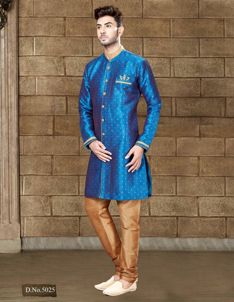 Royal-blue sherwani with gold accents and matching pocket square—ideal for celebrations.
