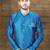 Royal-blue sherwani with gold accents and matching pocket square—ideal for celebrations.
