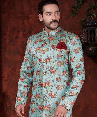 Aqua floral sherwani with gold buttons, maroon pocket square, and matching trousers. 2