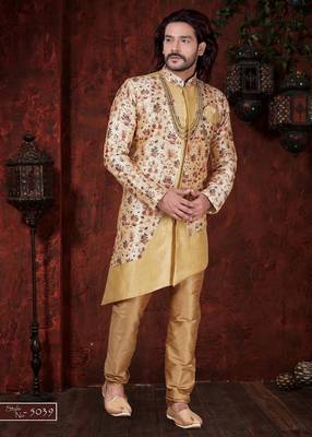 Cream floral sherwani with asymmetrical jacket, gold accents—ideal for weddings. 1