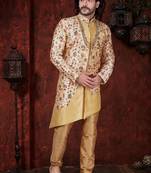 Cream floral sherwani with asymmetrical jacket, gold accents—ideal for weddings.