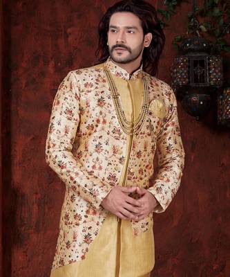 Cream floral sherwani with asymmetrical jacket, gold accents—ideal for weddings. 2