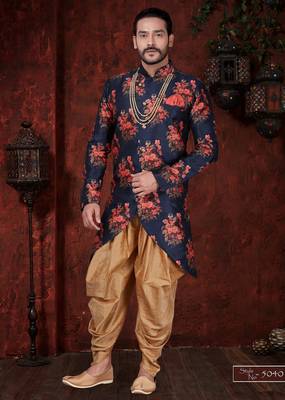 Navy blue floral sherwani with asymmetrical hem, pearl necklace, and gold trousers. 1