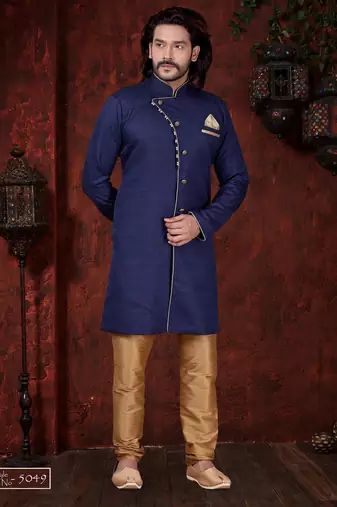 Navy-blue sherwani with asymmetrical placket, gold pocket square, and gold trousers.