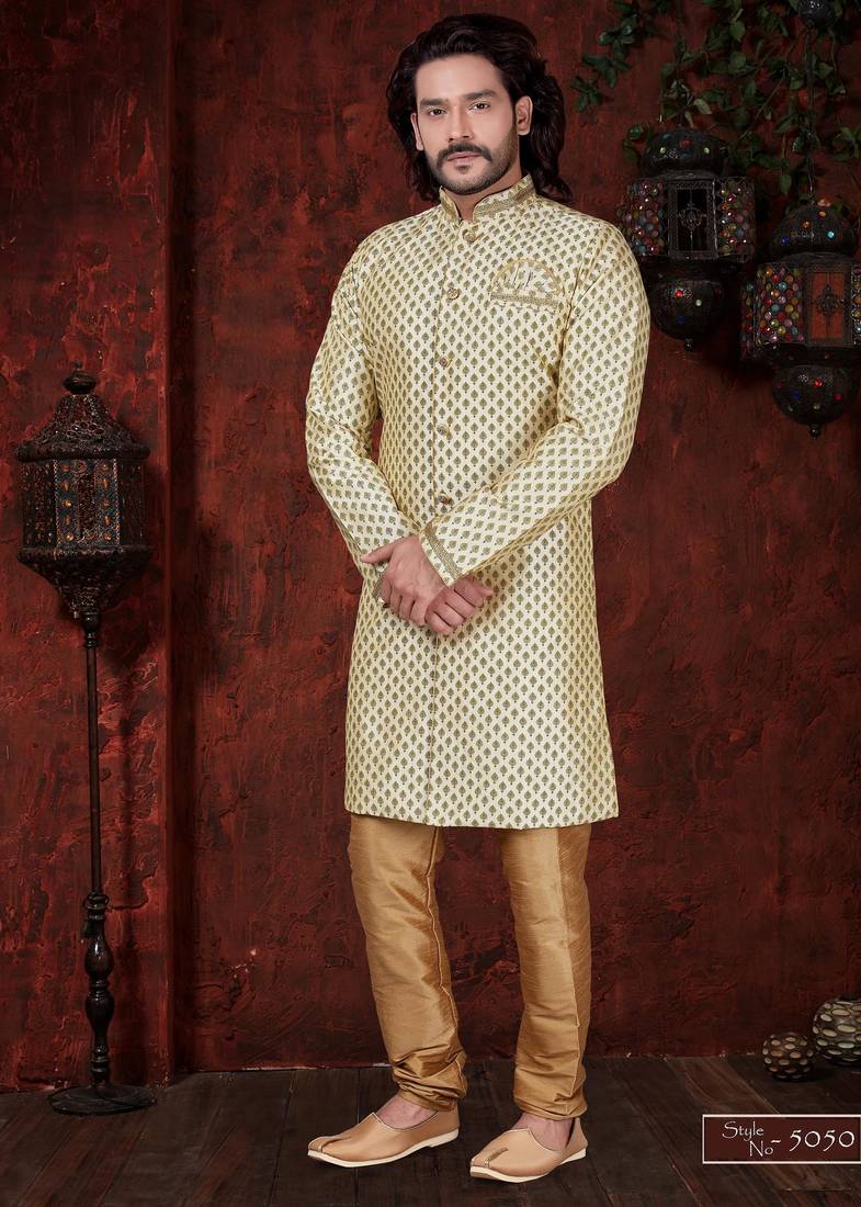 Fawn sherwani with gold motifs, matching pocket square, and gold trousers—ideal for weddings.