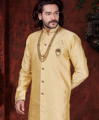 Golden-beige sherwani with stand collar, pearl necklace, and embellished pocket square. 2