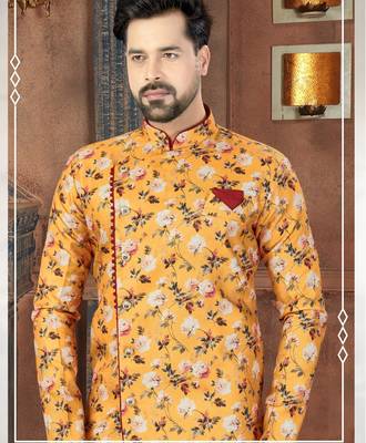 Mustard floral sherwani with burgundy pocket square and matching trousers. 2