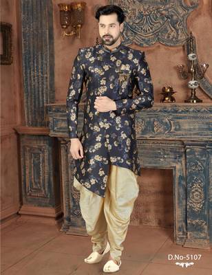 Navy floral sherwani with embellished pocket and ivory dhoti-style trousers. 1