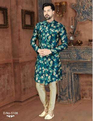 Teal floral sherwani with matching pocket square and ivory trousers. 1
