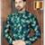 Teal floral sherwani with matching pocket square and ivory trousers.