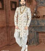 Off white floral sherwani with gold necklace, matching pocket square, and white trousers.