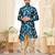 Teal floral sherwani with matching pocket square and cream dhoti-style trousers.
