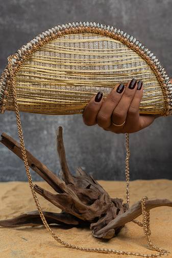 Gold silk embroidered hinted dome clutch