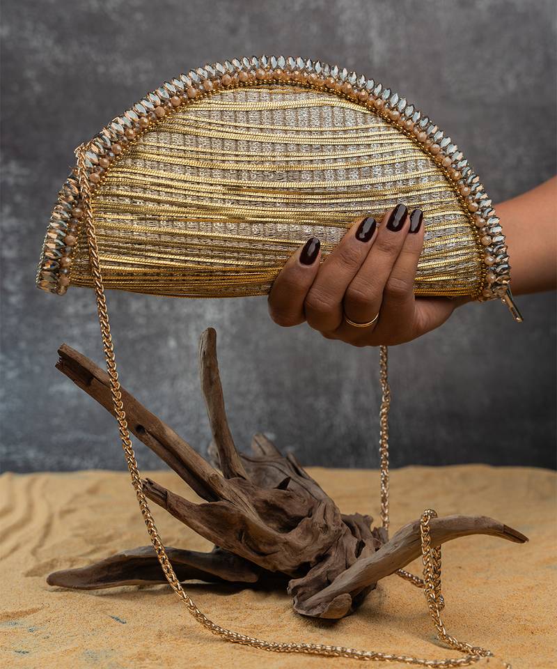 Gold silk embroidered hinted dome clutch
