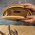 Gold silk embroidered hinted dome clutch