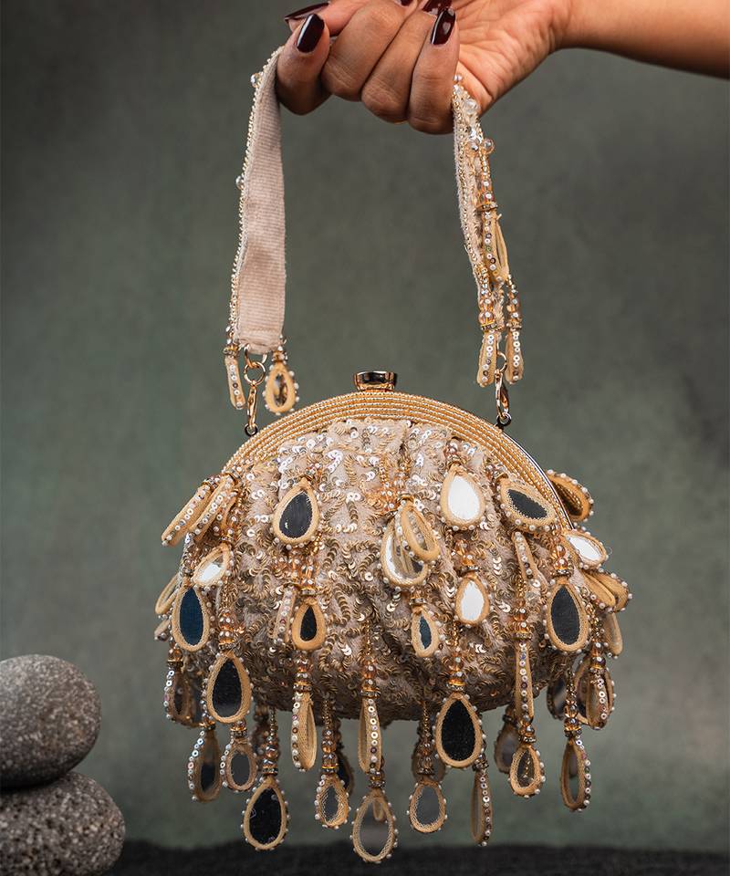 Gold silk embroidered clutch