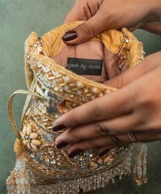 Gold silk embroidered imperial medley potli bag 2