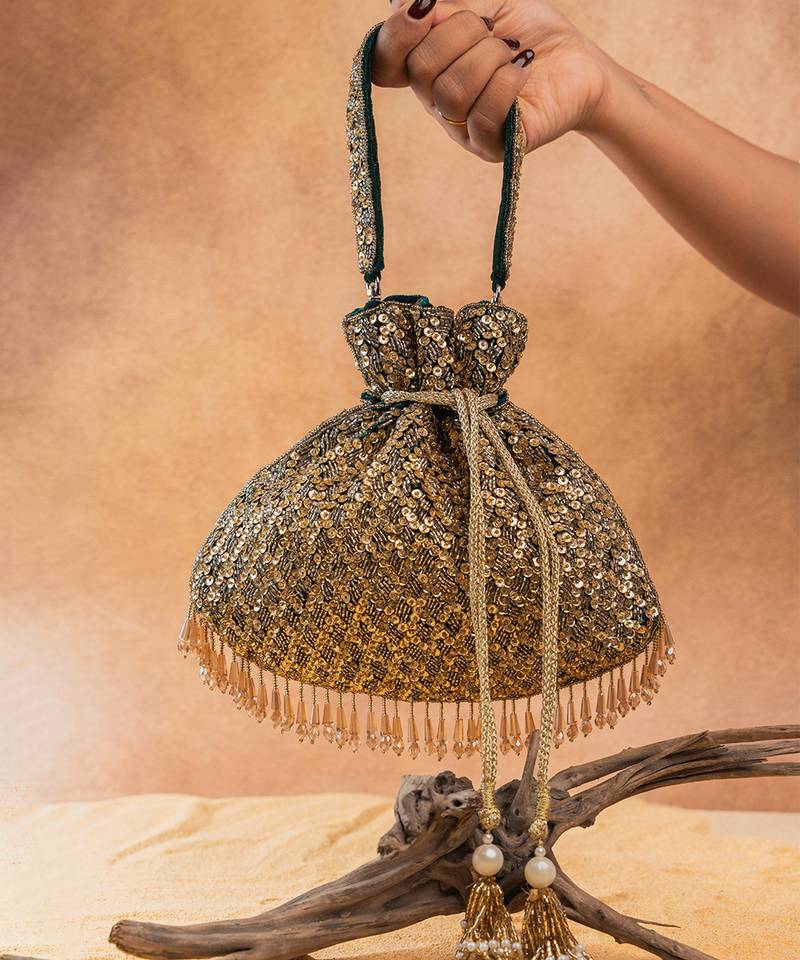 Antique gold silk embroidered shimmer viel potli bag