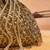 Antique gold silk embroidered shimmer viel potli bag