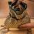 Antique gold silk embroidered shimmer viel potli bag