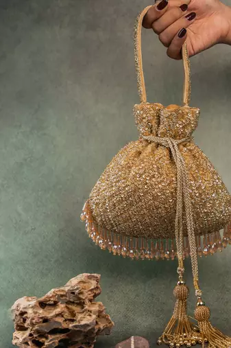 Gold silk embroidered shimmer viel potli bag