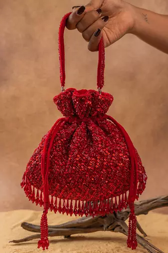 Red silk embroidered shimmer viel potli bag