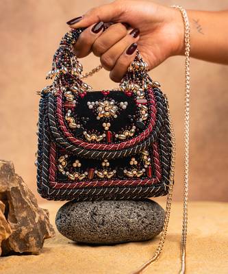 Black velvet embroidered noir hand bag 1
