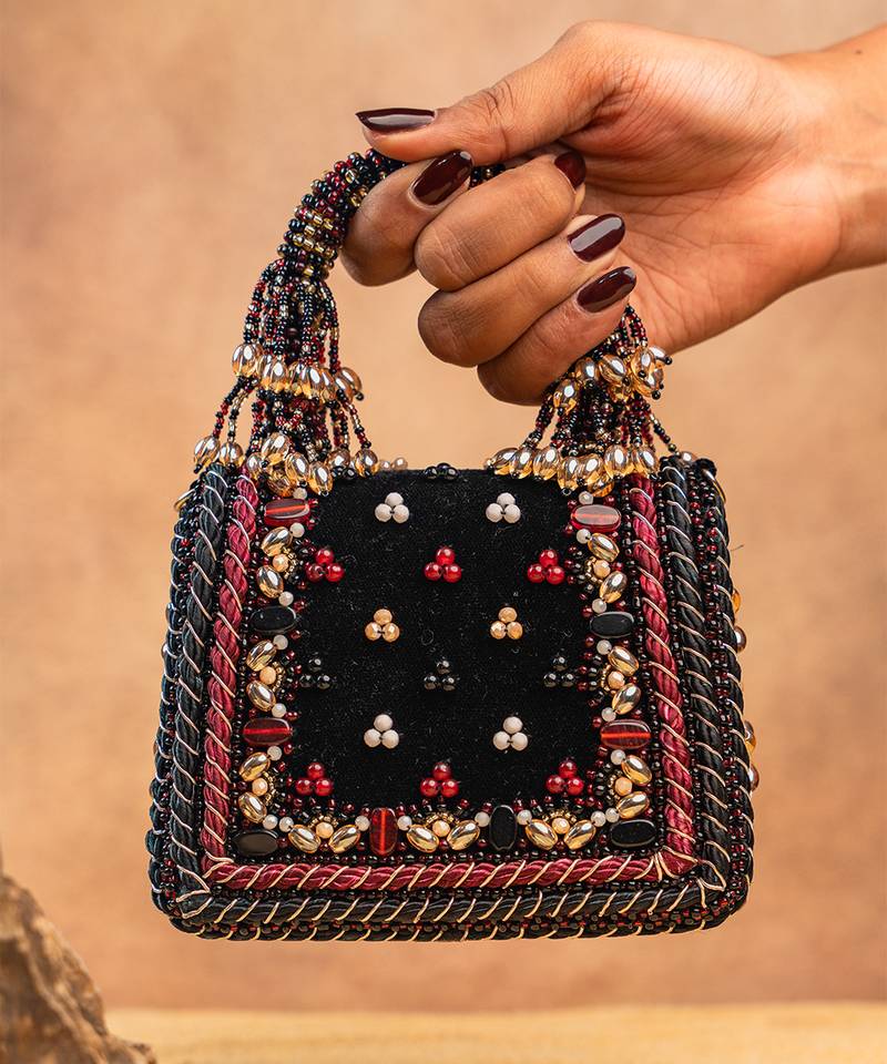 Black charm wine silk embroidered hand bag