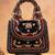 Black charm wine silk embroidered hand bag