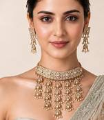 Gold plated handcrafted jadau necklace set with pearl tassels