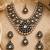 Gold plated kundan polki necklace set with maang tikka and earrings