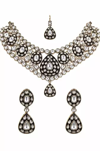 Gold plated kundan polki necklace set with maang tikka and earrings
