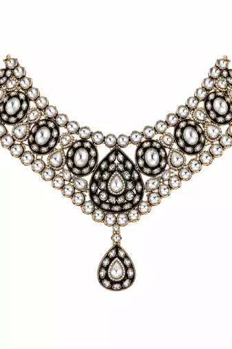 Gold plated kundan polki necklace set with maang tikka and earrings