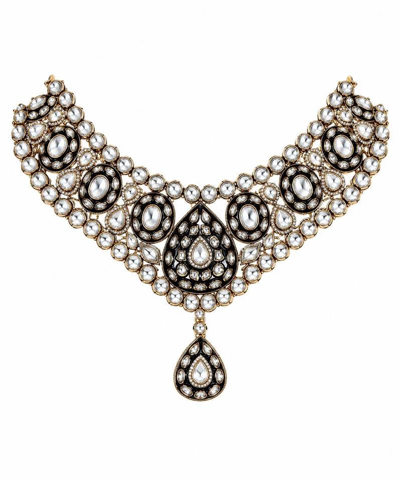 Gold plated kundan polki necklace set with maang tikka and earrings