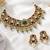 Sage green semi precious stone kundan choker set with ruby accents and pearl drops