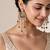 Gold plated metallic kundan tassel earrings