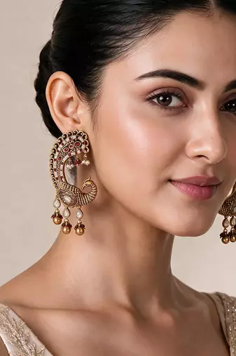 Gold plated ruby red peacock motif statement earrings