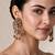 Gold plated ruby red peacock motif statement earrings