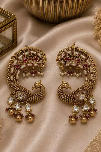 Gold plated ruby red peacock motif statement earrings